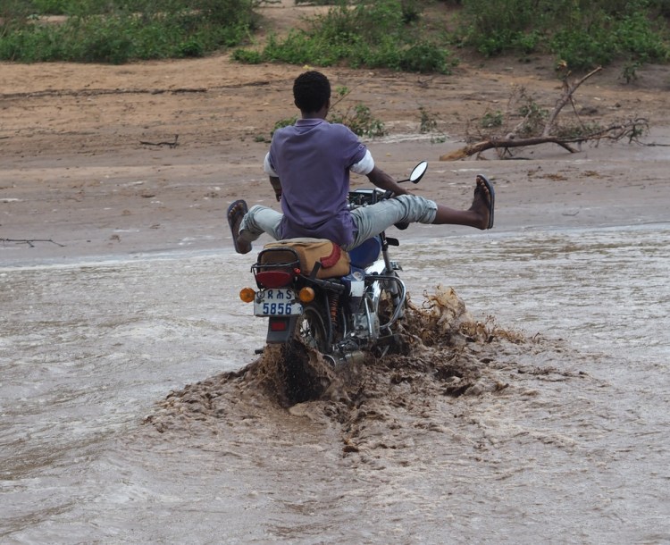 Minutes later the dry river bed looks like this, in a flash.....