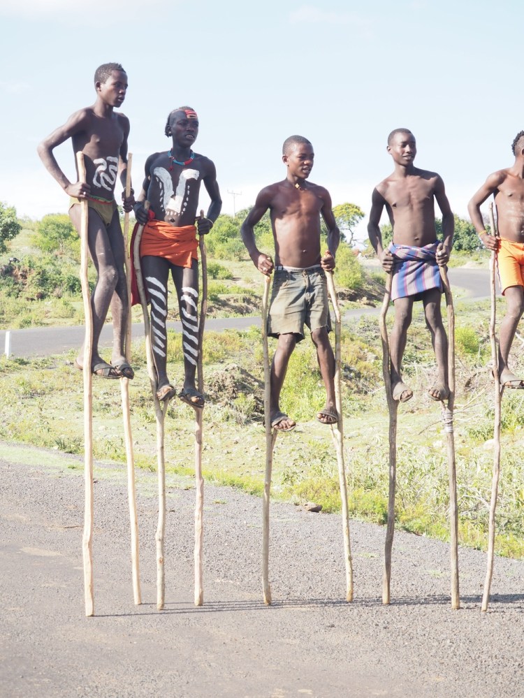 Boys on stilts