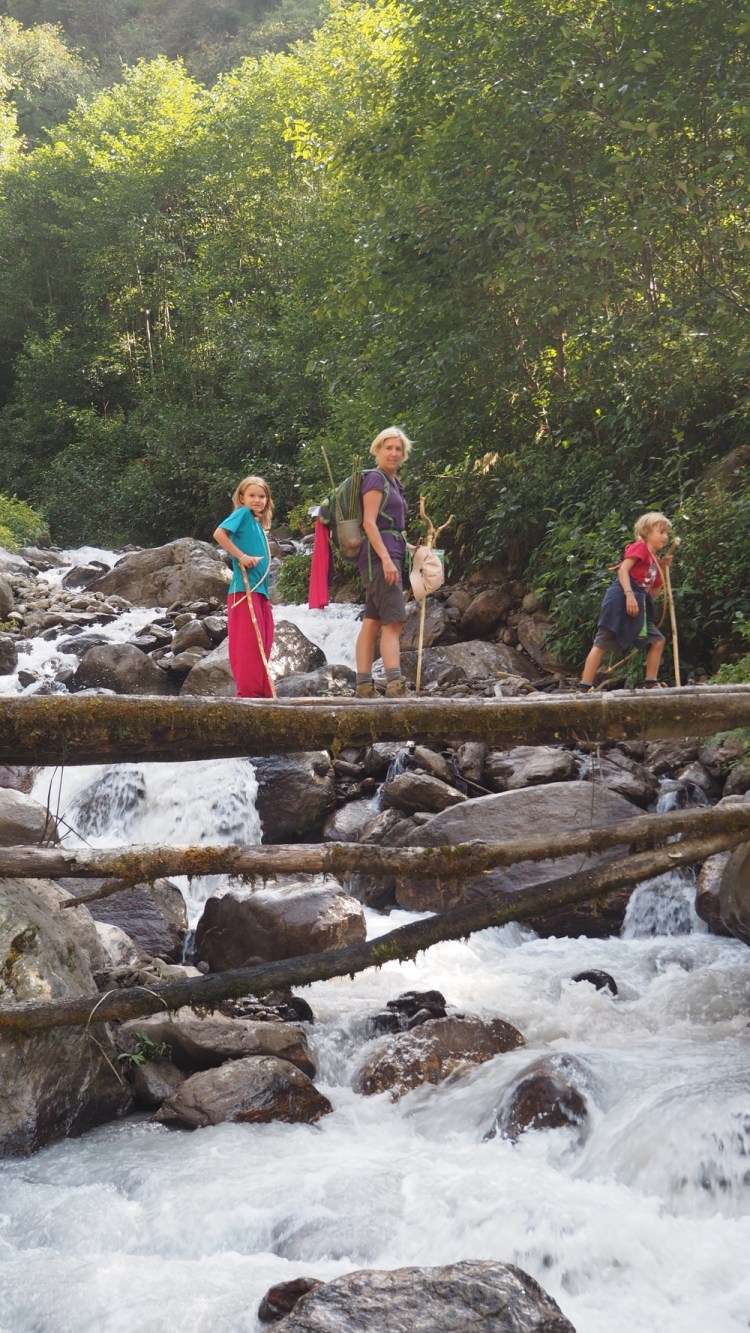 Crossing a bridge at the bottom end of the Langtang trail