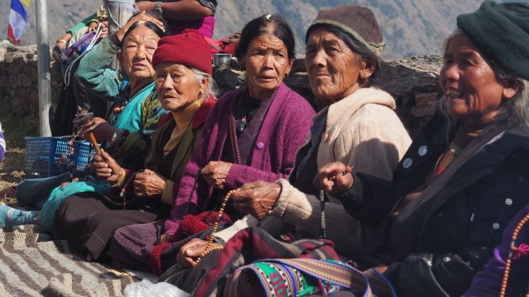 Karma arranges a meeting with the locals and a lot of the villagers attend&nbsp;