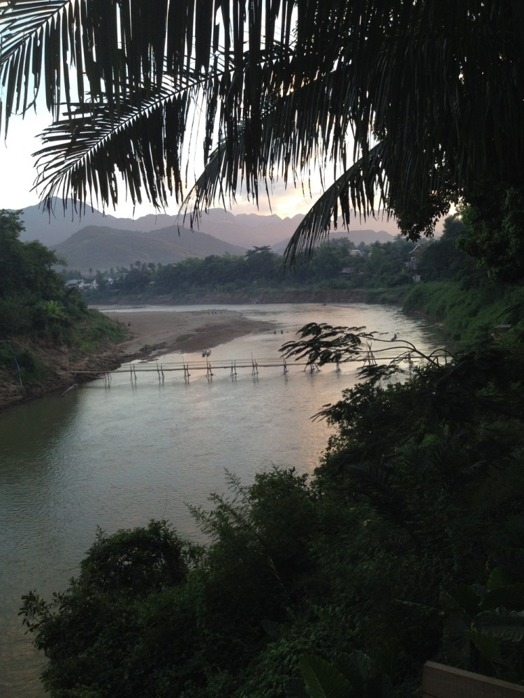 The view up the Nam Khan river from our revised hotel choice