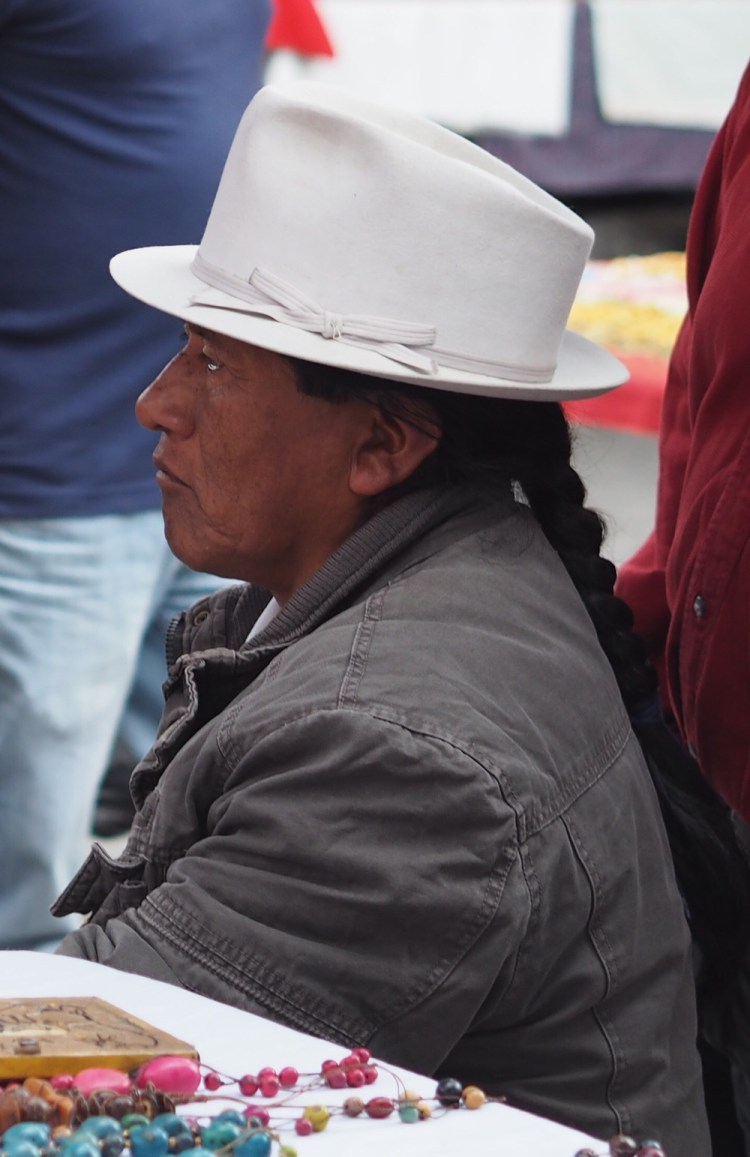The men also wear their hair long &amp; plaited with a felt hat