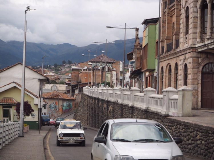 Typical Cuenca architecture, with murels on the buildings and the beautiful mountainous surroundings