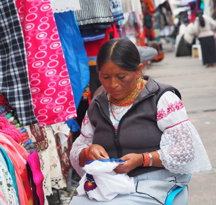 The traditional embroidered blouse, being worn and being made! 