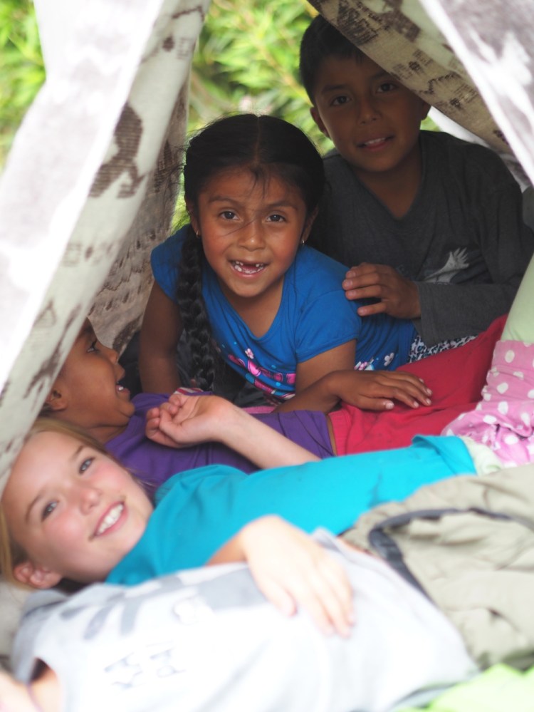 The children run off to play, Lack of a communal language doesn't seem to hinder their play.