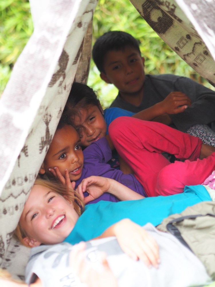 Adela and all her family come and spend Sunday with us, the children all play inside this tent in the garden
