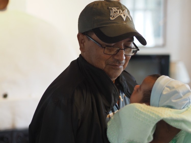 Jorge, Adela's husband and grandson Isaac 