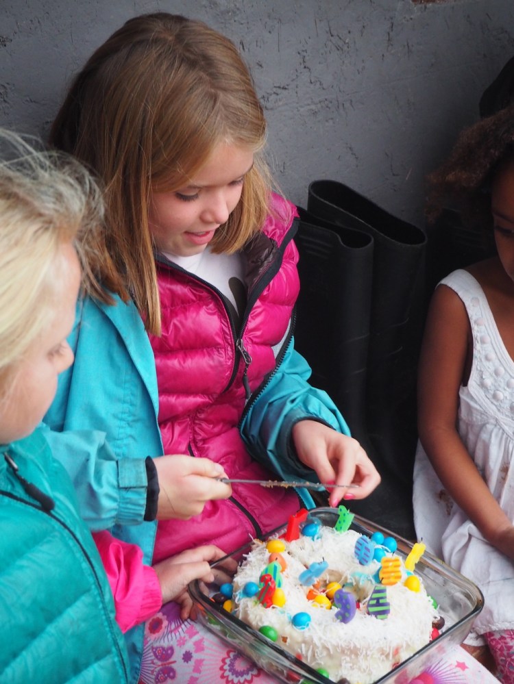 Getting stuck into the birthday cake after r eventful horse riding