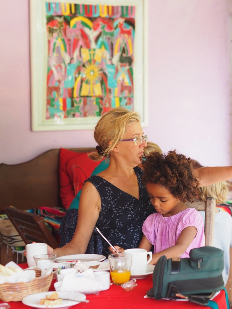 A typical moment in a restaurant, with children drawing.  