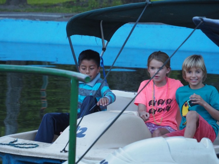 Me and Joshua and Gabtiel on the boats in the park