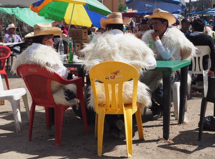 The men start tucking in to their Posh ( locally brewed alcohol &nbsp;drink and by midday.  they are all drunk)&nbsp;